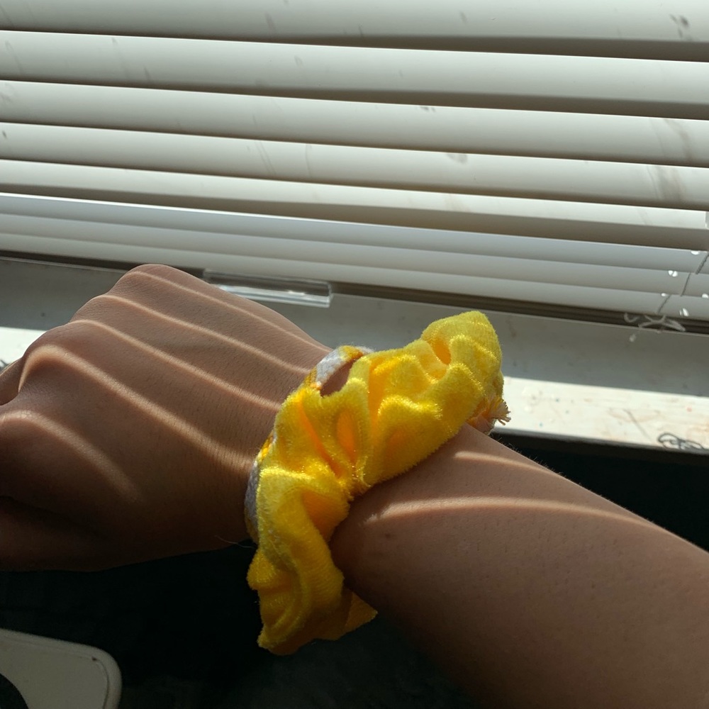 adorable yellow friendship bracelet with scrunchy!